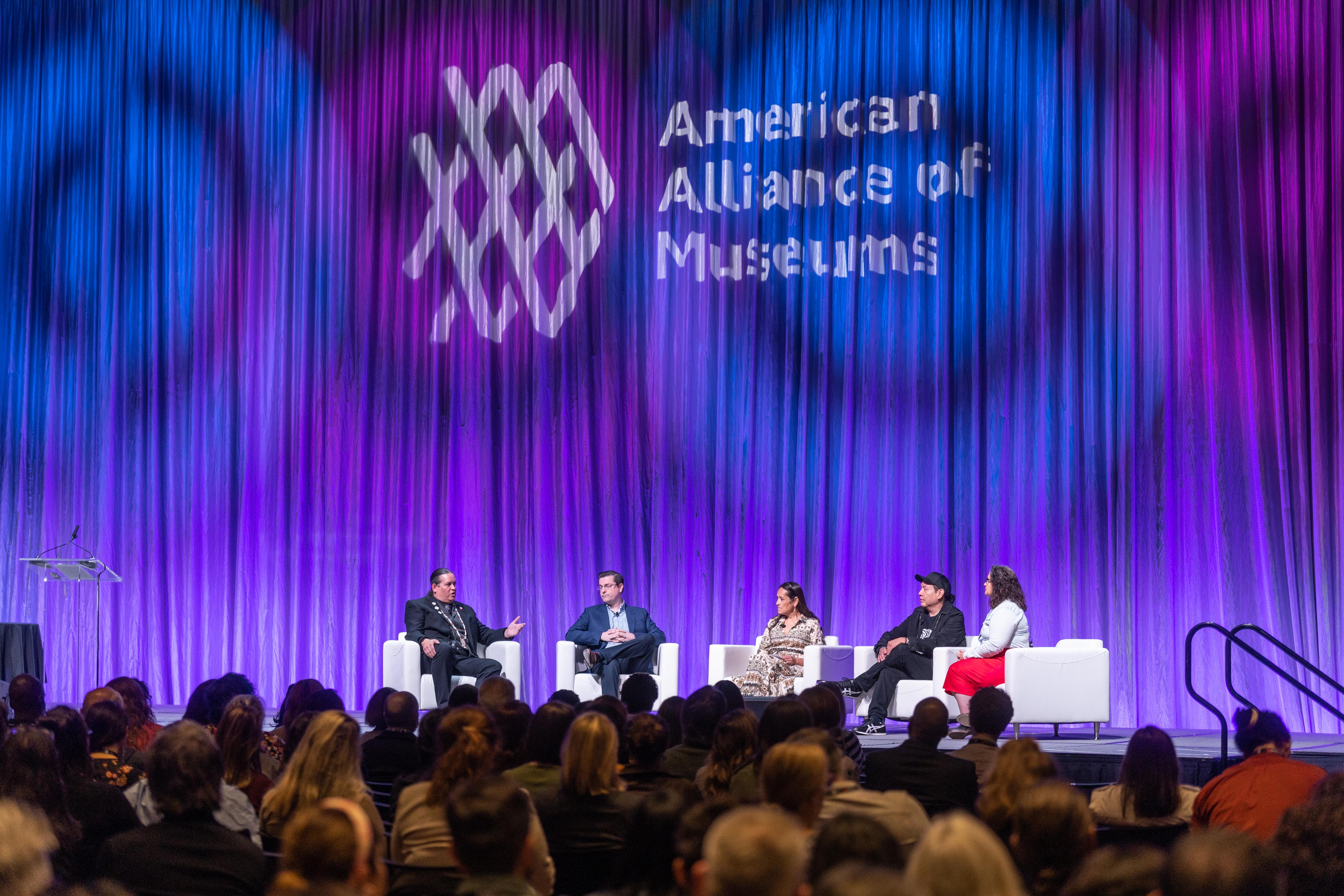 The keynote panel at the 2023 AAM Annual Meeting & MuseumExpo in discussion on stage in front of a large crowd.