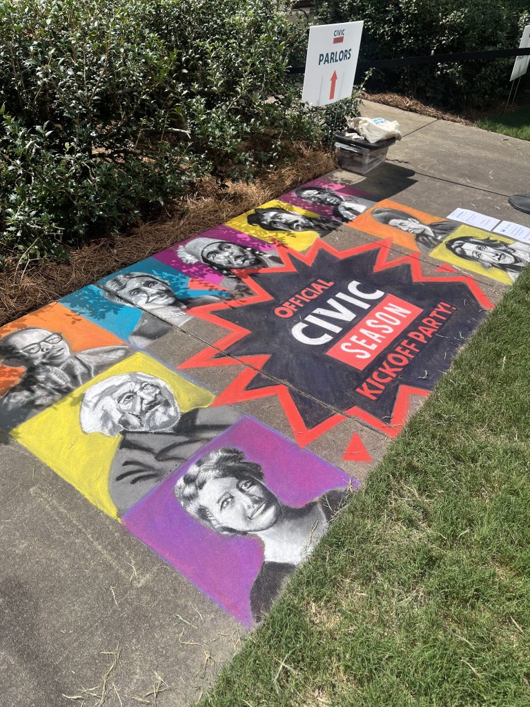 A detailed sidewalk chalk drawing with the words "Official Civic Season Kickoff Party!" surrounded by images of famous American activists