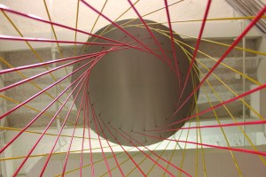 “Hyper Hyperboloid” at the National Museum of Mathematics is an interactive exhibition that invites visitors to create a curved surface made entirely out of straight lines. Image courtesy of the National Museum of Mathematics (MoMath)