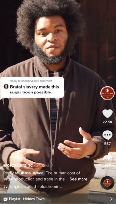 A screenshot from the Old Salem TikTok account replying to a comment reading "Brutal slavery made this sugar boon possible"