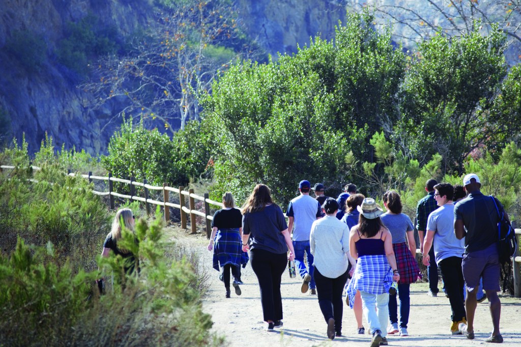 Team members connect outdoors during a Museum of Us staff retreat at Mission Trails Regional Park in San Diego, California.Phot credit: Shelby Miller for the Museum of Us